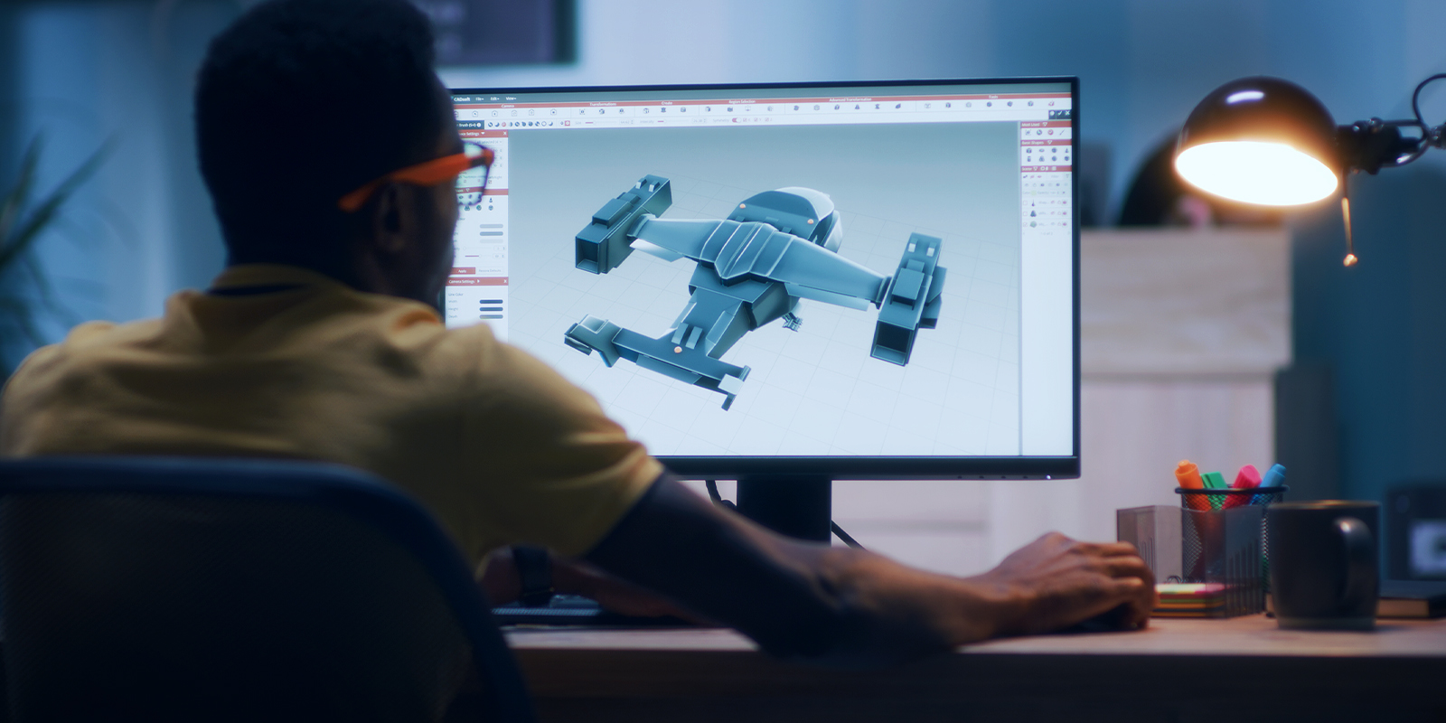 Designer working at computer on 3D model, representing Autodesk’s acquisition of Wonder Dynamics in digital design and visual effects.